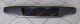 REAR BUMPER MOULDING (METAL DARK)